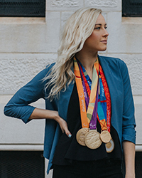 Jessica long with many of the Paralympic medals she has won.